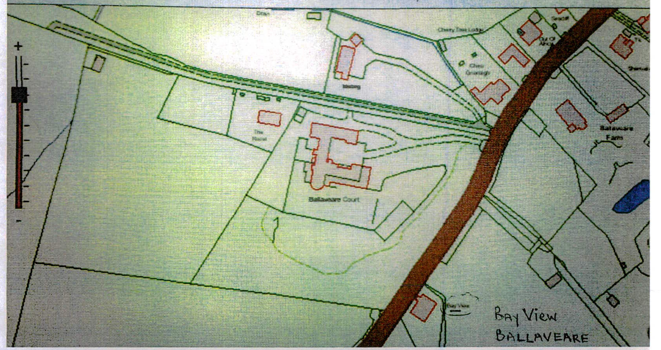This image displays a site plan map showing property boundaries and building footprints outlined in red. It depicts the location of 'Ballavare Court' and surrounding properties in a rural setting.