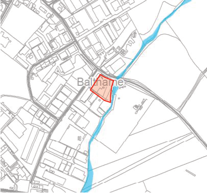 A site location plan showing a specific plot of land highlighted in red, situated near a stream and road network.