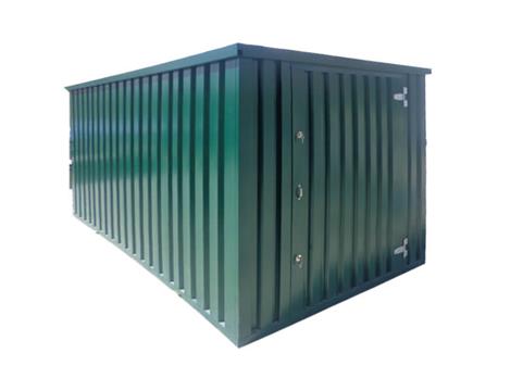 A green corrugated metal storage container or shipping container isolated on a white background.