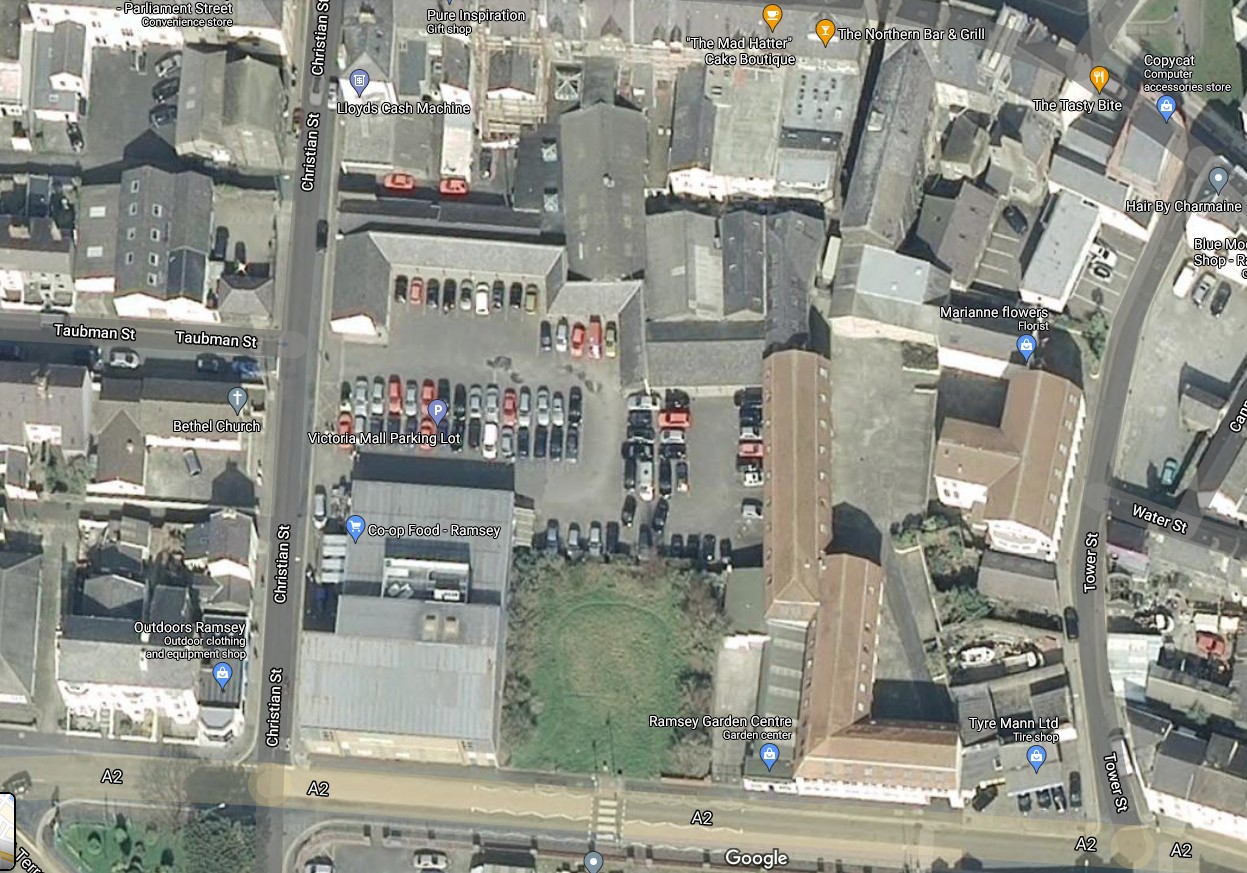 Aerial satellite map view of Ramsey town center showing the Victoria Mall Parking Lot and surrounding commercial buildings and streets.