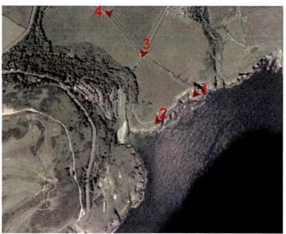 Annotated aerial view of a coastal site with red numbered arrows indicating specific locations or boundaries.
