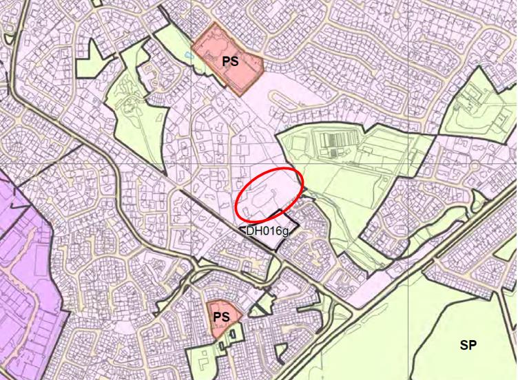 A zoning or land-use map showing a specific site outlined in red, surrounded by residential streets and green areas.
