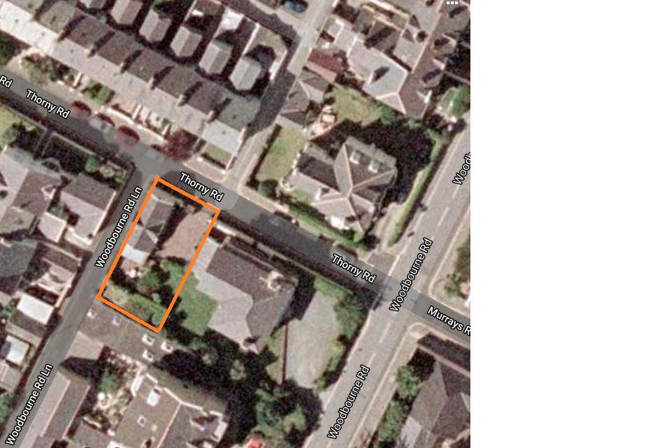 An aerial site location map showing a residential area with an orange rectangular outline highlighting the specific property boundary at the junction of Thorny Road and Woodbourne Road Lane.