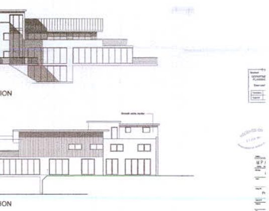 Architectural elevation and section drawings depicting the design of a proposed agricultural building.