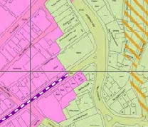 A colored site location map showing property boundaries, street names, and a specific development site highlighted in pink.