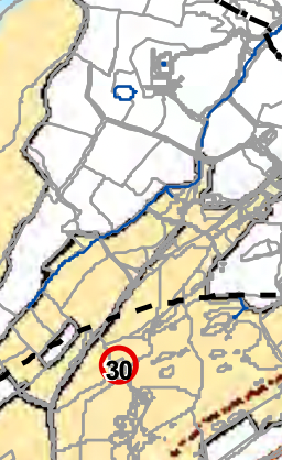 A site location map showing rural roads, agricultural fields, and a watercourse with a speed limit marker.