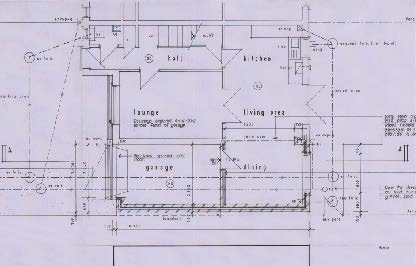 This image shows a technical architectural drawing, likely a floor plan or section, detailing the layout of a proposed dwelling including a garage, lounge, and kitchen.