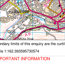 A topographical map extract showing the site location with surrounding streets and buildings, including text detailing boundary limits and scale.