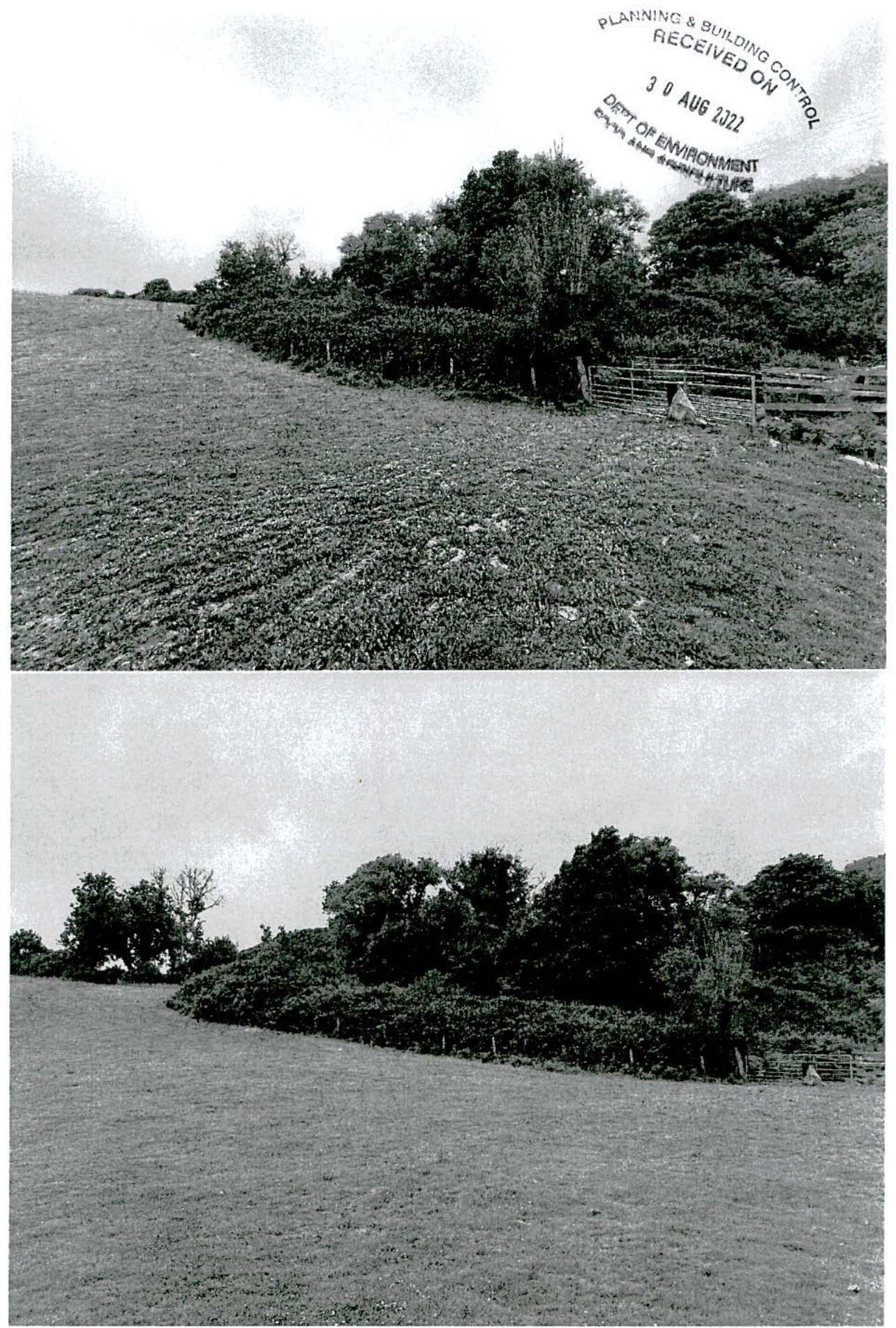 Two black and white photographs showing a grassy field sloping up towards a line of trees and a fence, with a planning department received stamp visible in the top image.