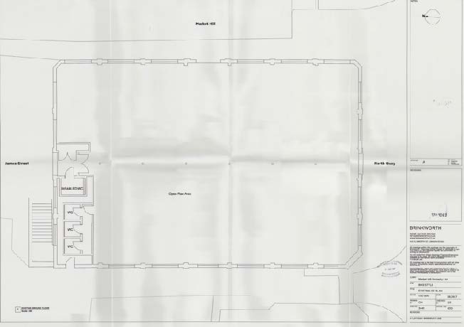 Architectural floor plan showing a large open plan area with a staircase and WC facilities on the left side, labeled with street names America Street and North Quay.