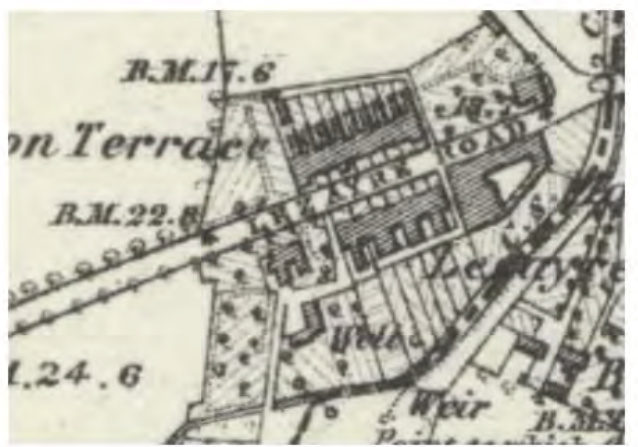 A cropped section of a historical topographical map showing buildings, roads, and a weir in the Lezayre area.