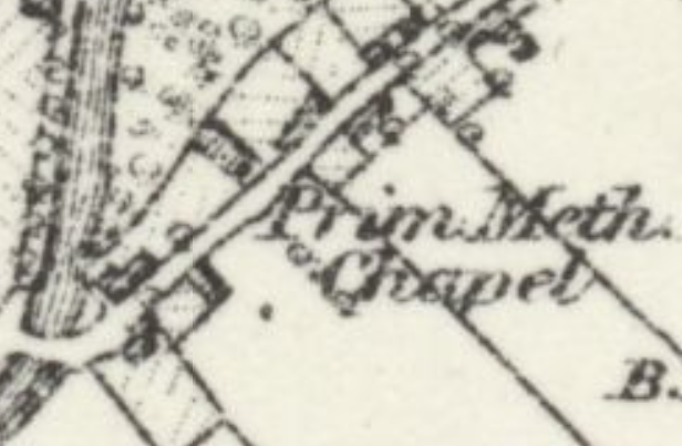 A close-up of a historical map showing a building labeled 'Prim Meth. Chapel' with surrounding property boundaries and road lines.
