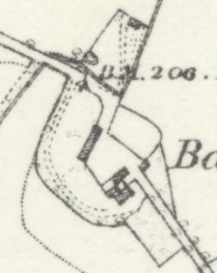 A close-up section of a site location plan or OS map extract showing property boundaries, a road, and building footprints with elevation markers.