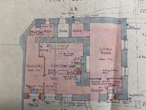 A detailed architectural floor plan showing the internal layout of a house, including a kitchen, scullery, and living room, with handwritten notes indicating proposed alterations and new walls.