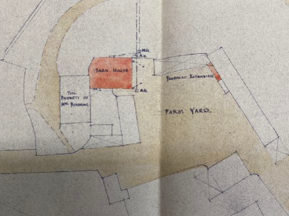 A hand-drawn site plan sketch showing the layout of a 'Farm House' and a 'Proposed Extension' adjacent to a 'Farm Yard'.