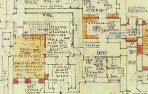 A detailed architectural floor plan showing room layouts including bedrooms and kitchen with annotations for existing and new walls and fixtures.