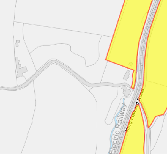 A planning map showing a site boundary highlighted in yellow adjacent to the Manx Electric Railway line.