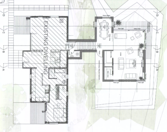 Architectural floor plan showing an existing dwelling and a proposed extension with detailed room layouts and furniture.