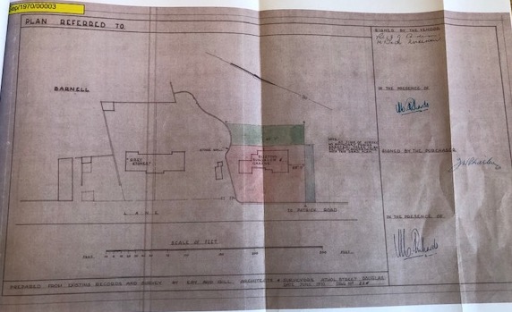 A scanned site plan titled 'PLAN REFERRED TO' showing property boundaries, existing structures including 'The Barn', and highlighted areas with a scale bar and handwritten annotations.
