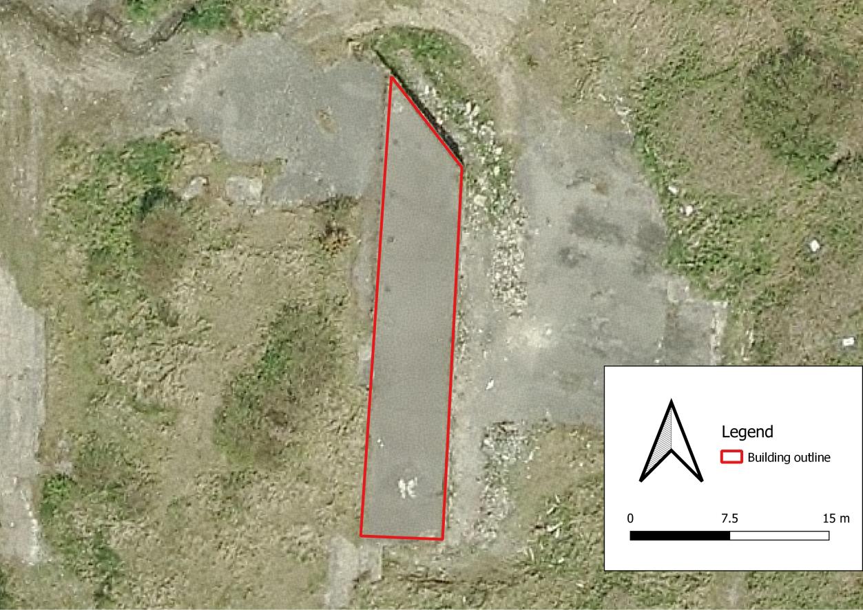 An aerial site plan displaying a red outline of a building footprint on a grassy and paved area, with a legend and scale bar.