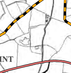 Extract from a site plan showing field boundaries, roads, and land parcels.