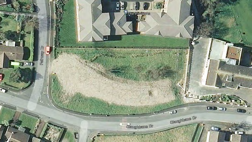 An aerial satellite view of a rectangular plot of land bordered by Fairway Drive and Claughbane Drive, showing surrounding residential properties and a development named 'The Paxtons'.