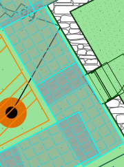 This image displays a zoomed-in section of a site plan or landscape drawing, featuring colored zones for landscaping and hatched areas indicating paving or hardstanding. It includes a symbol representing a tree or spe...