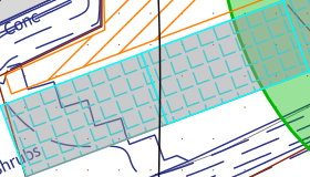 A close-up view of a technical site plan showing boundary lines, hatched areas, and partial text labels.