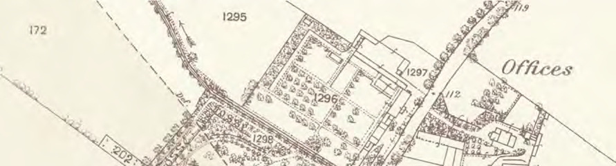 A black and white map extract showing property boundaries, vegetation, and a road, with plot numbers and a building labeled 'Offices'.