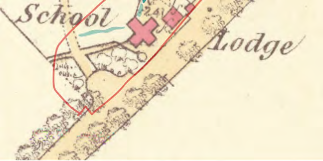 A cropped section of a vintage map showing a red boundary line outlining a property near a 'School' and 'Lodge'.