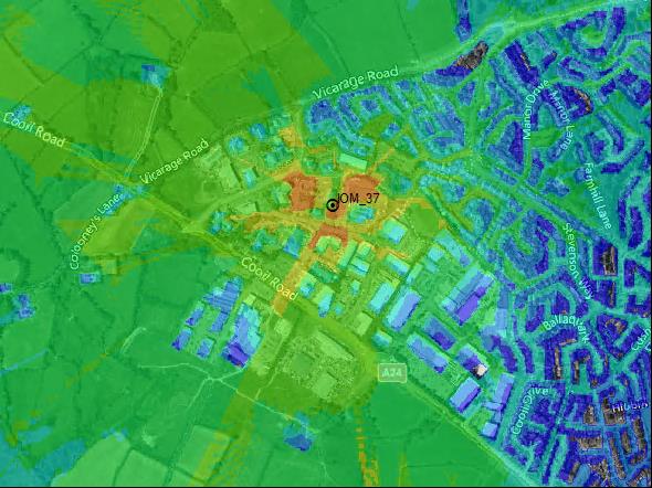 A digital topographical map displaying the site location marked as OM_37, surrounded by road networks and mixed rural terrain.