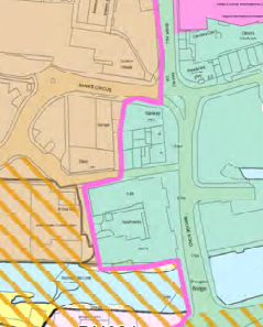 A site plan map showing property boundaries, surrounding roads, and land use areas marked with pink outlines and yellow hatching.