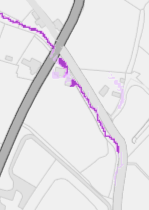 A site plan showing the application area marked with a purple boundary line, alongside nearby roads and structures.