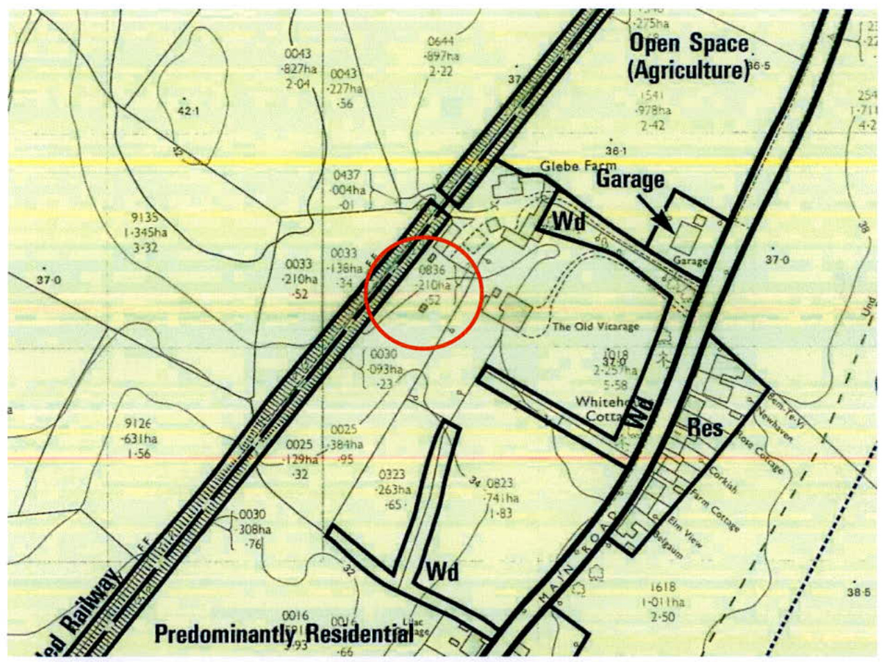 This is a site location map showing land parcels, field boundaries, and existing buildings such as Glebe Farm and The Old Vicarage. It highlights a specific plot near a railway line and indicates land use zones like '...