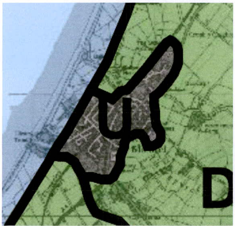 A cropped section of a topographical map showing a specific site boundary outlined in a thick black line near a coastline.