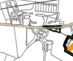 A cropped site location plan showing the application site boundaries highlighted in black and orange near a main road.