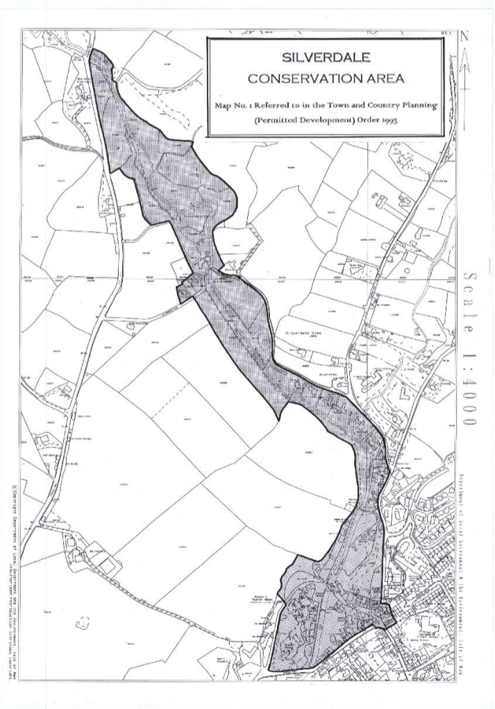 This is a black and white map titled 'Silverdale Conservation Area' showing the designated conservation zone boundary shaded in grey over a map of fields and roads.
