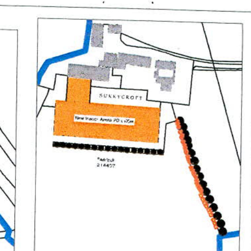A site plan showing the proposed location of a new equestrian arena (orange area) adjacent to an existing building labeled 'SUNNYCROFT'.