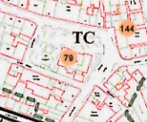 A site plan or survey map showing property boundaries outlined in red, building footprints, and reference numbers such as 79 and 144.