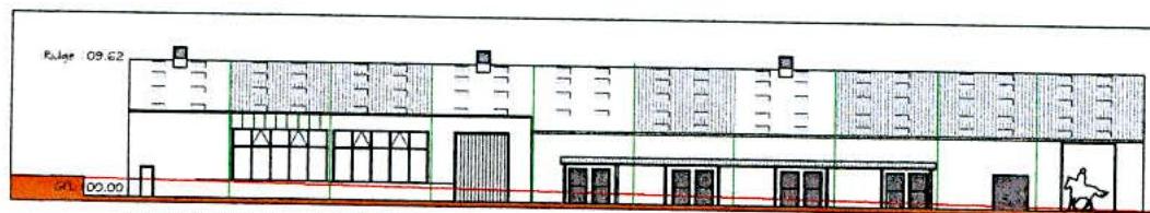 This is an architectural elevation drawing of a long, single-story equestrian building, showing windows, doors, and roof details with height markers.