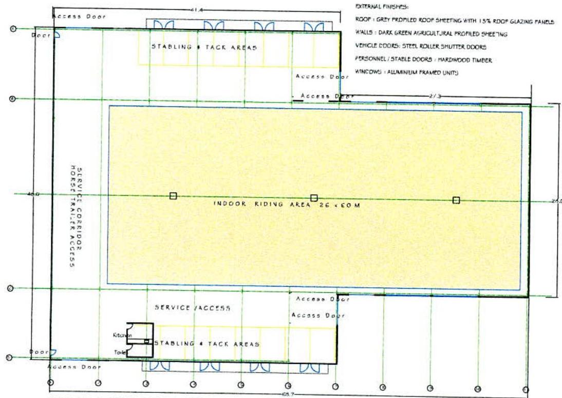 The image displays a detailed architectural floor plan for a proposed equestrian building, featuring an indoor riding arena, stabling areas, and service corridors. It includes technical notes on external finishes and...