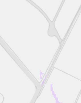 A low-contrast map snippet displaying road networks and boundary lines, likely a site location plan.