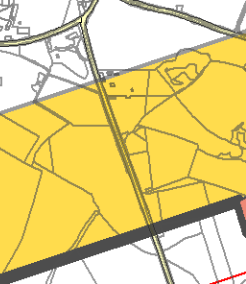 A site plan showing land parcels highlighted in yellow with black boundary lines and road networks.