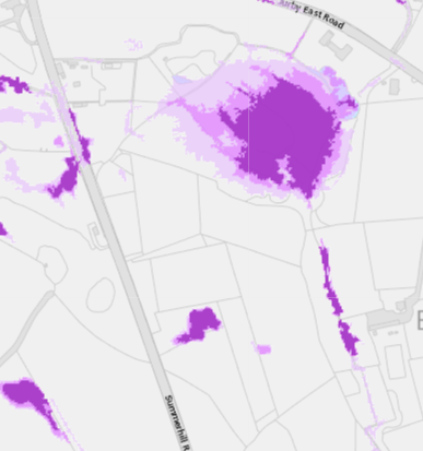 A digital map showing field boundaries and roads with purple highlighted areas indicating the proposed campsite location.
