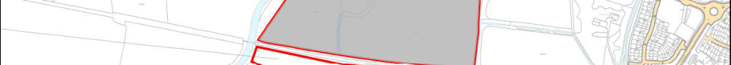 A site plan showing a large proposed development area outlined in red and shaded grey, situated adjacent to existing residential housing and rural fields.