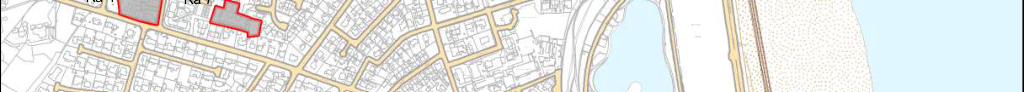 A site location plan showing a residential street layout with two specific plots highlighted in red near a coastal area.