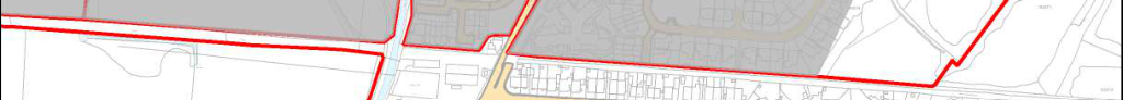 The image displays a site plan or location map featuring a prominent red boundary line outlining the development area, with surrounding roads and existing housing visible.
