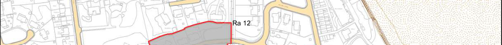 A site location plan showing a specific plot of land highlighted in grey with a red boundary line, surrounded by existing buildings and roads.