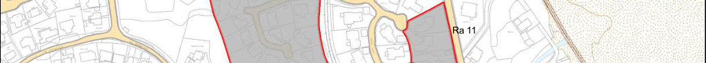 A site plan excerpt showing existing buildings and roads with a red boundary line highlighting the development area labeled 'Ra 11'.