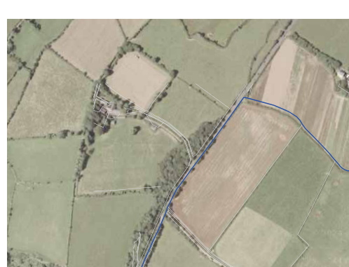 Aerial site plan showing a rural property with blue lines indicating boundaries and access routes.